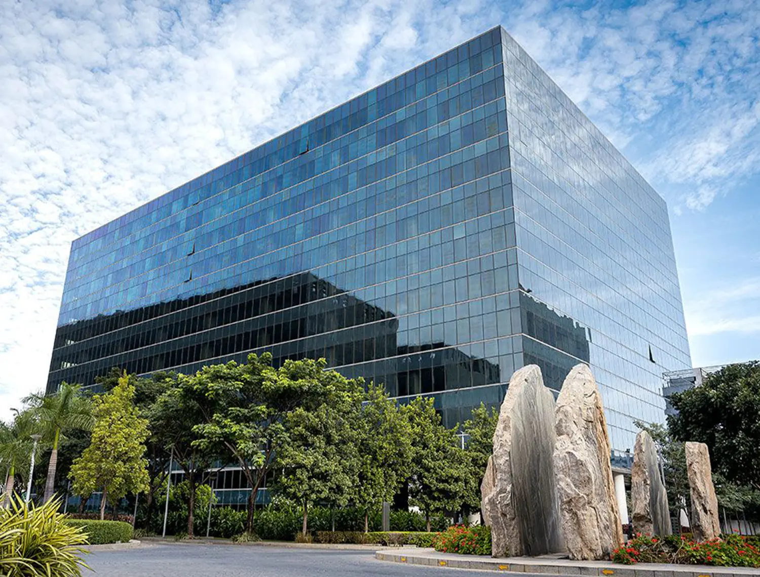 Glass-facade office building in Bengaluru where NextGen Events Group is located